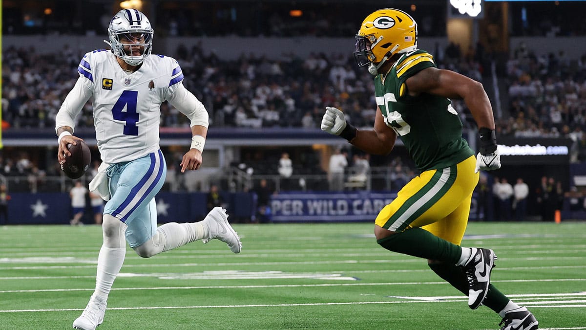 Dallas Cowboys quarterback Dak Prescott (4) rushes for a touchdown against Green Bay Packers linebacker Kingsley Enagbare (55) during the second half for the 2024 NFC wild card game at AT&T Stadium.