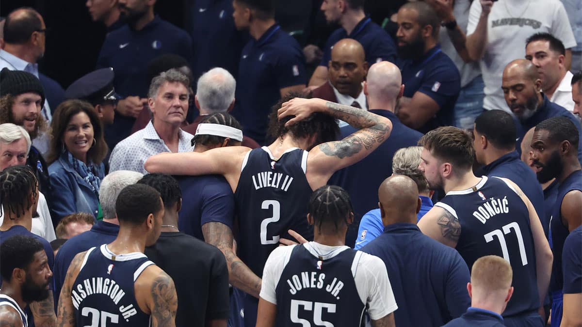 May 26, 2024; Dallas, Texas, USA; Dallas Mavericks center Dereck Lively II (2) leaves the court after an injury in the second quarter against the Minnesota Timberwolves during game three of the western conference finals for the 2024 NBA playoffs at American Airlines Center. Mandatory Credit: Kevin Jairaj-USA TODAY Sports