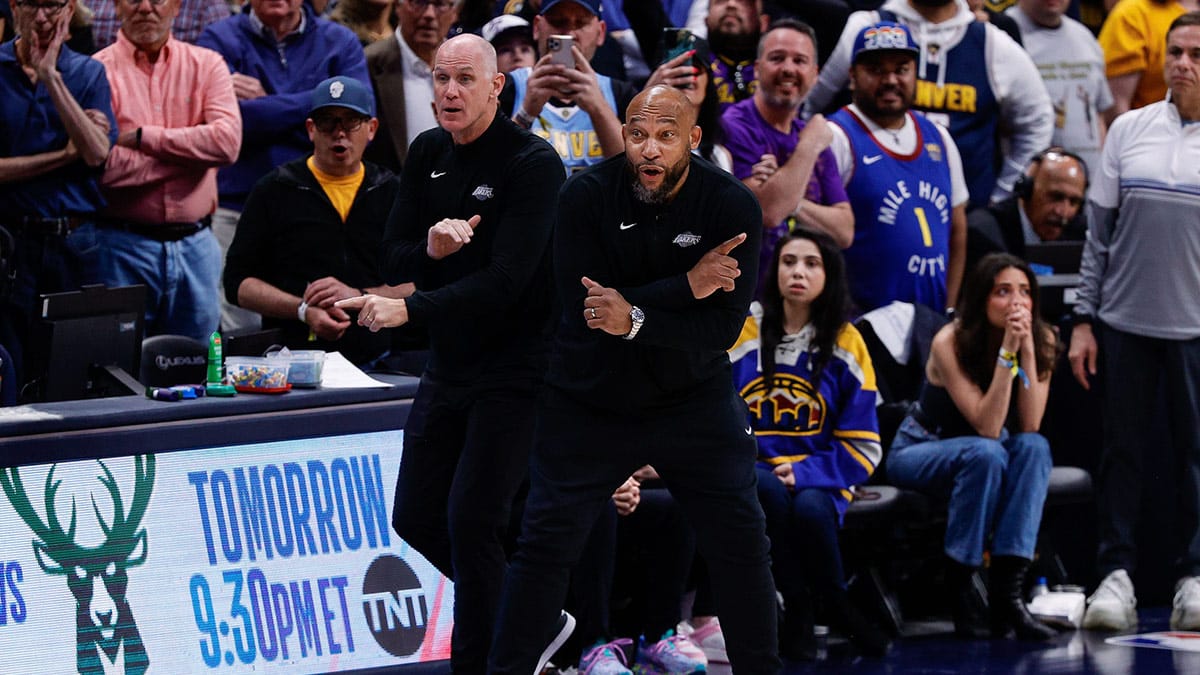 Los Angeles Lakers head coach Darvin Ham (R) and assistant coach Chris Jent (L) gesture in the fourth quarter against the Denver Nuggets during game five of the first round for the 2024 NBA playoffs at Ball Arena.