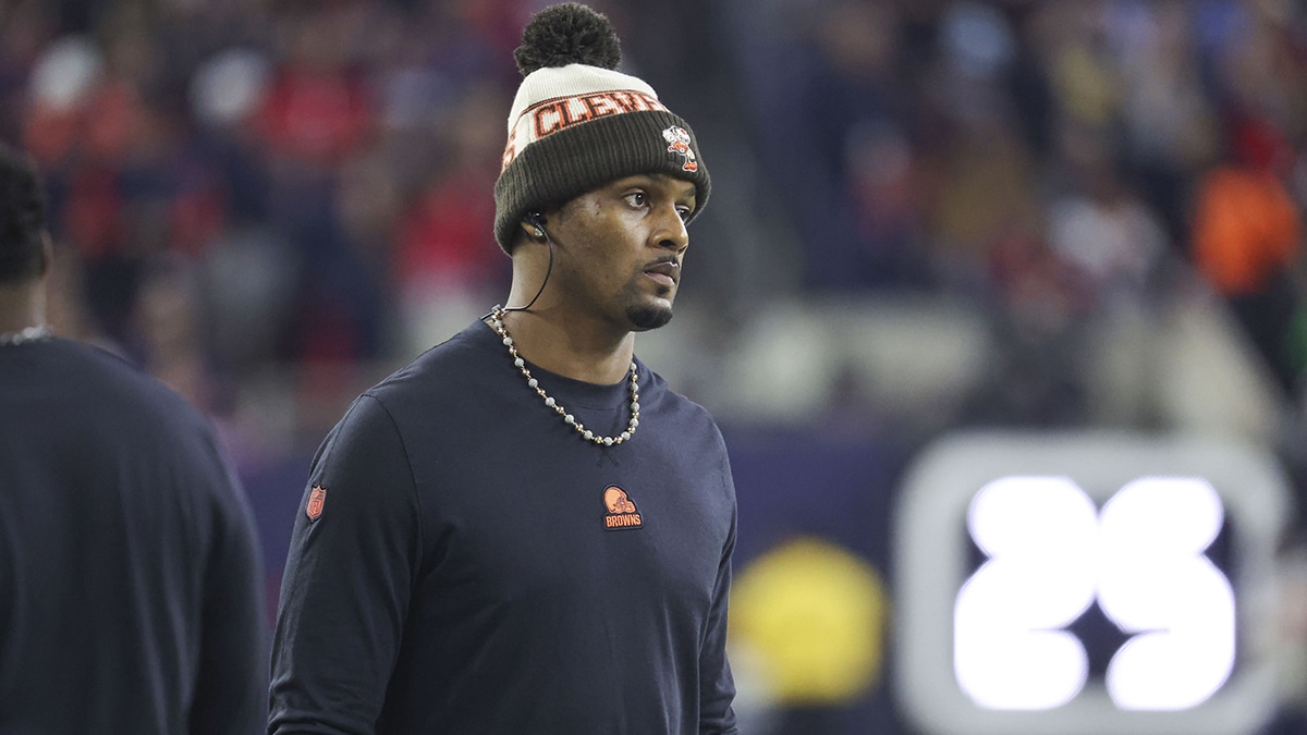 Cleveland Browns quarterback Deshaun Watson looks on from the sideline in a 2024 AFC wild card game against the Houston Texans at NRG Stadium.