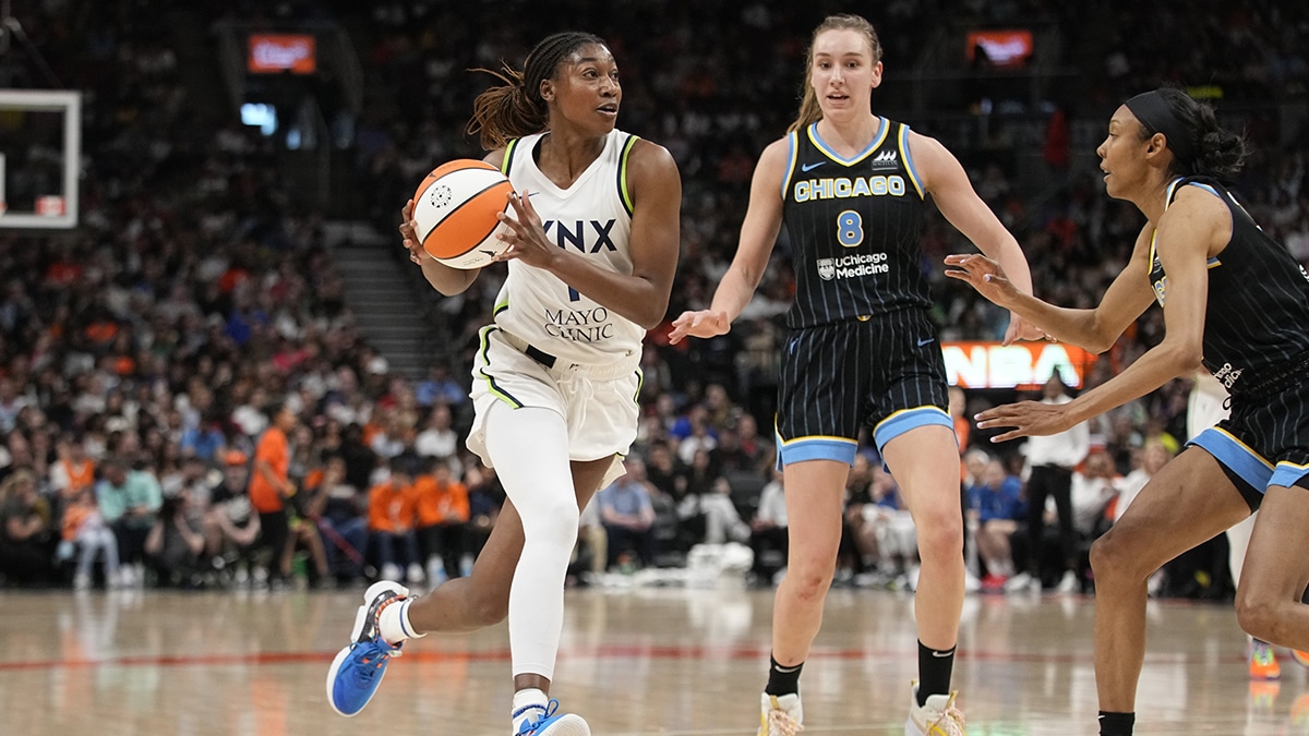 Minnesota Lynx forward Diamond Miller (1) drives to the net past Chicago Sky forward Alanna Smith (8) during the second half.