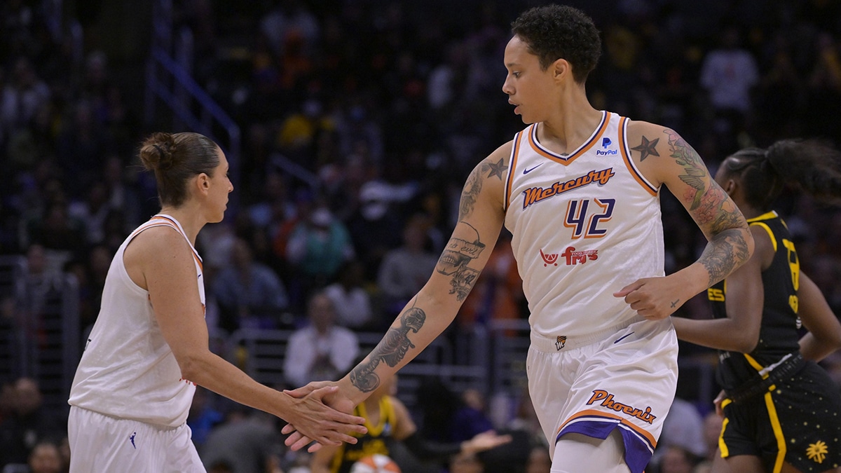 Phoenix Mercury guard Diana Taurasi (3) and center Brittney Griner (42) head down court after a basket in the first half against the Los Angeles Sparks at Crypto.com Arena.