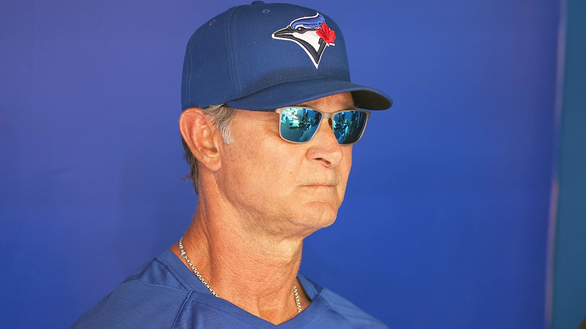 Toronto Blue Jays bench coach Don Mattingly (23) talks with the media during batting practice against the Milwaukee Brewers at Rogers Centre