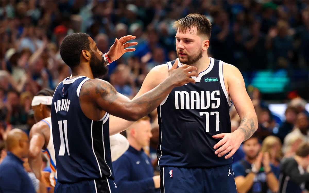 Dallas Mavericks guard Luka Doncic (77) celebrates with Dallas Mavericks guard Kyrie Irving (11) after the game against the Oklahoma City Thunder during game three of the second round for the 2024 NBA playoffs at American Airlines Center. 