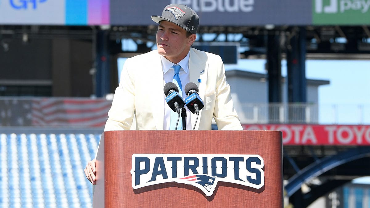 New England Patriots quarterback Drake Maye speaks to media on the game field after being drafted in the first round at Gillette Stadium.