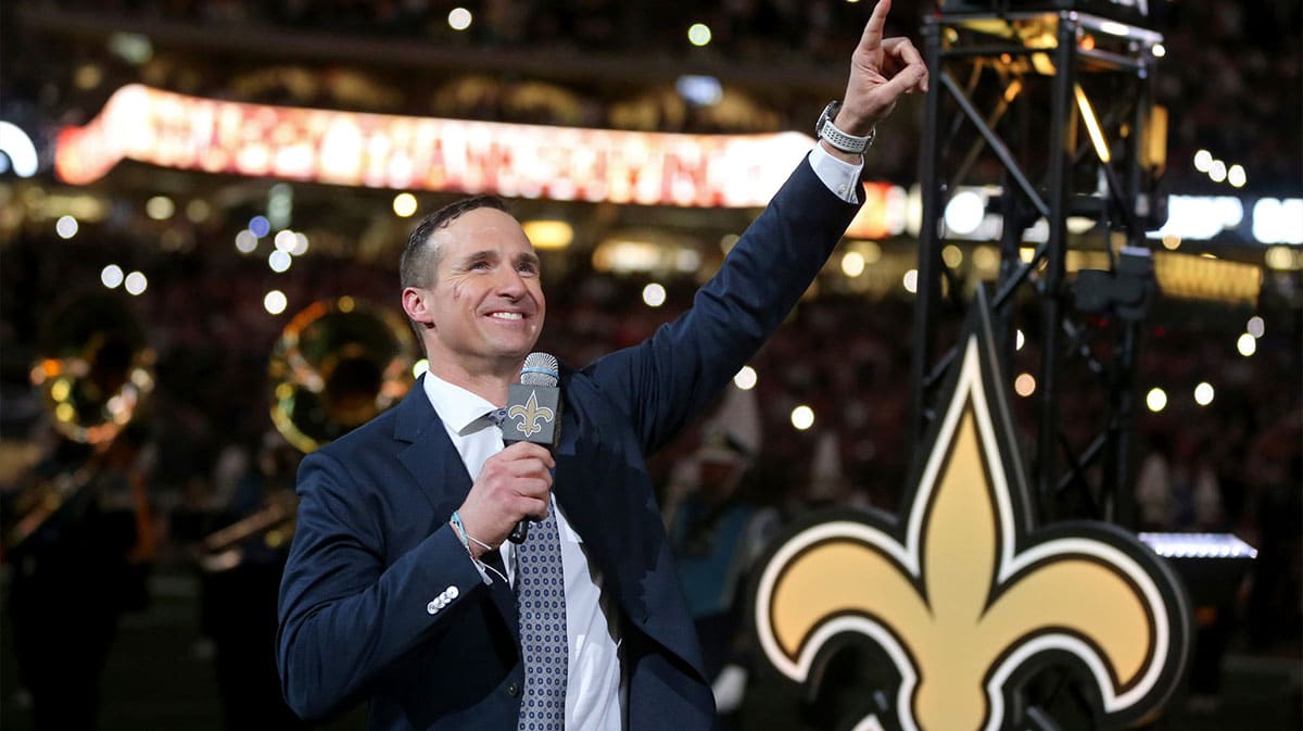 Former New Orleans Saints quarterback Drew Brees is honored at halftime of the game between the New Orleans Saints and the Buffalo Bills at the Caesars Superdome.