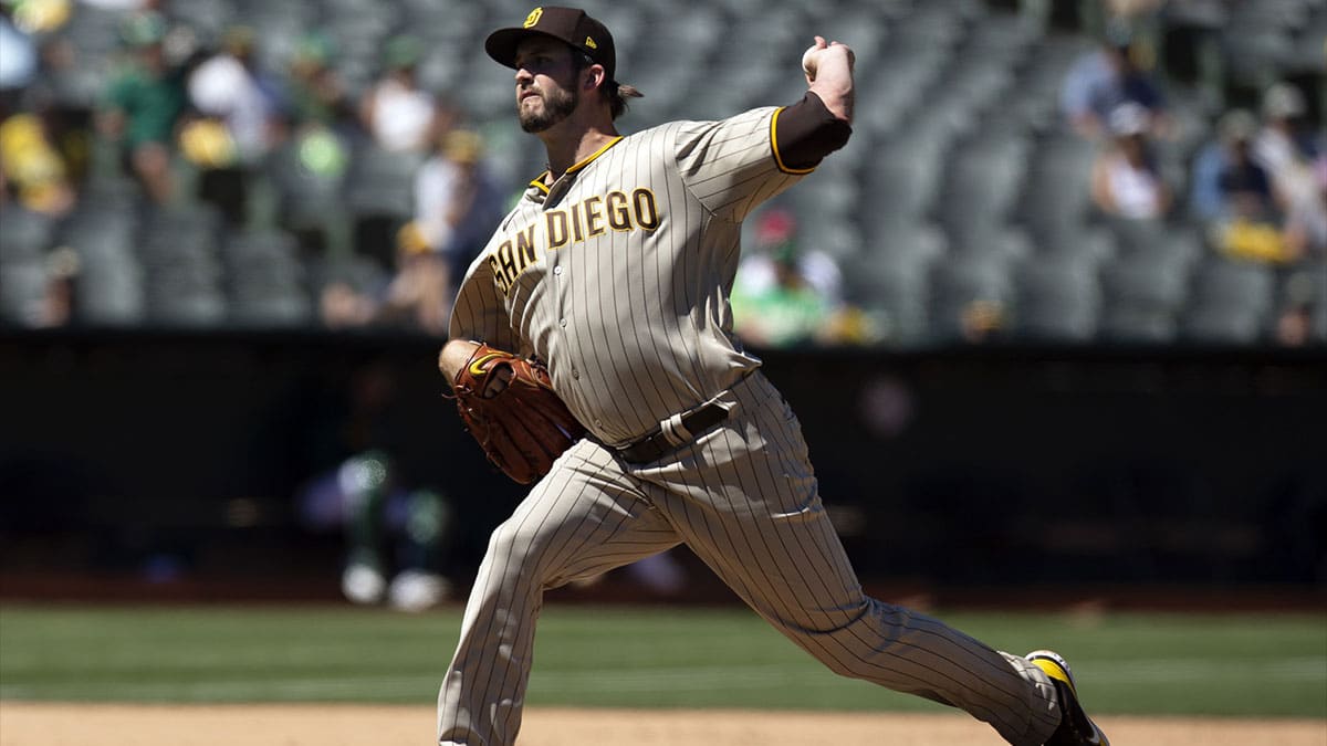 Oakland, California, USA; San Diego Padres relief pitcher Drew Pomeranz (15) throws a pitch against the Oakland Athletics in the eighth inning at RingCentral Coliseum. 