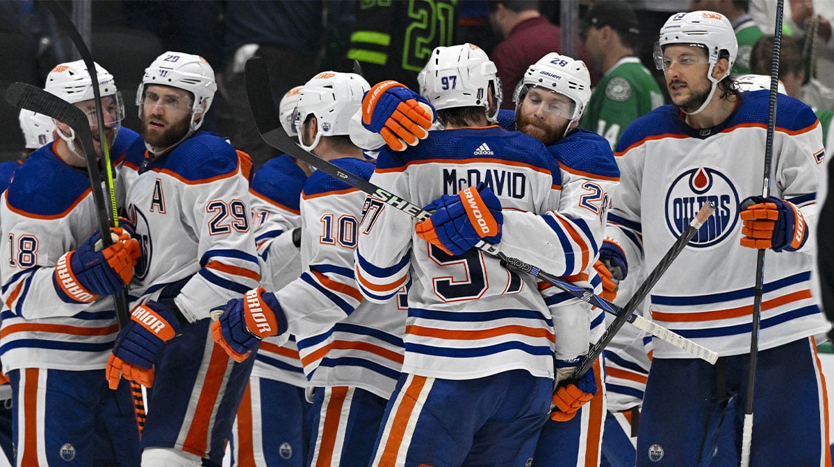 The Edmonton Oilers celebrates center Connor McDavid (97) scoring the game winning goal against the Dallas Stars during the second overtime period in game one of the Western Conference Final of the 2024 Stanley Cup Playoffs at American Airlines Center.