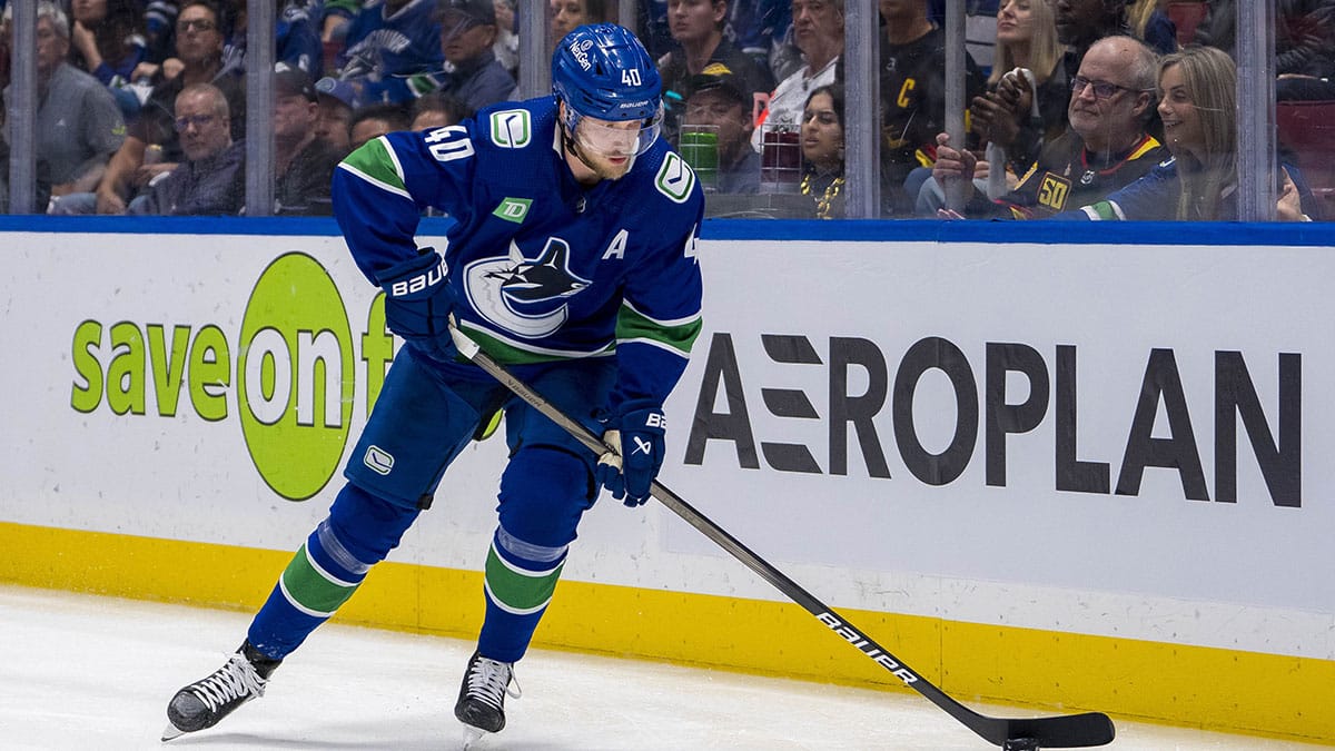 Vancouver Canucks forward Elias Pettersson (40) handles the puck against the Edmonton Oilers during the third period in game two of the second round of the 2024 Stanley Cup Playoffs at Rogers Arena.