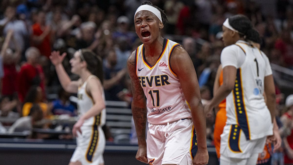 Indiana Fever guard Erica Wheeler (17) reacts after scoring during the second half of an WNBA basketball game against the Connecticut Sun.