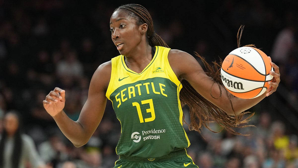 Seattle Storm center Ezi Magbegor (13) dribbles the ball against the Phoenix Mercury during the second half.