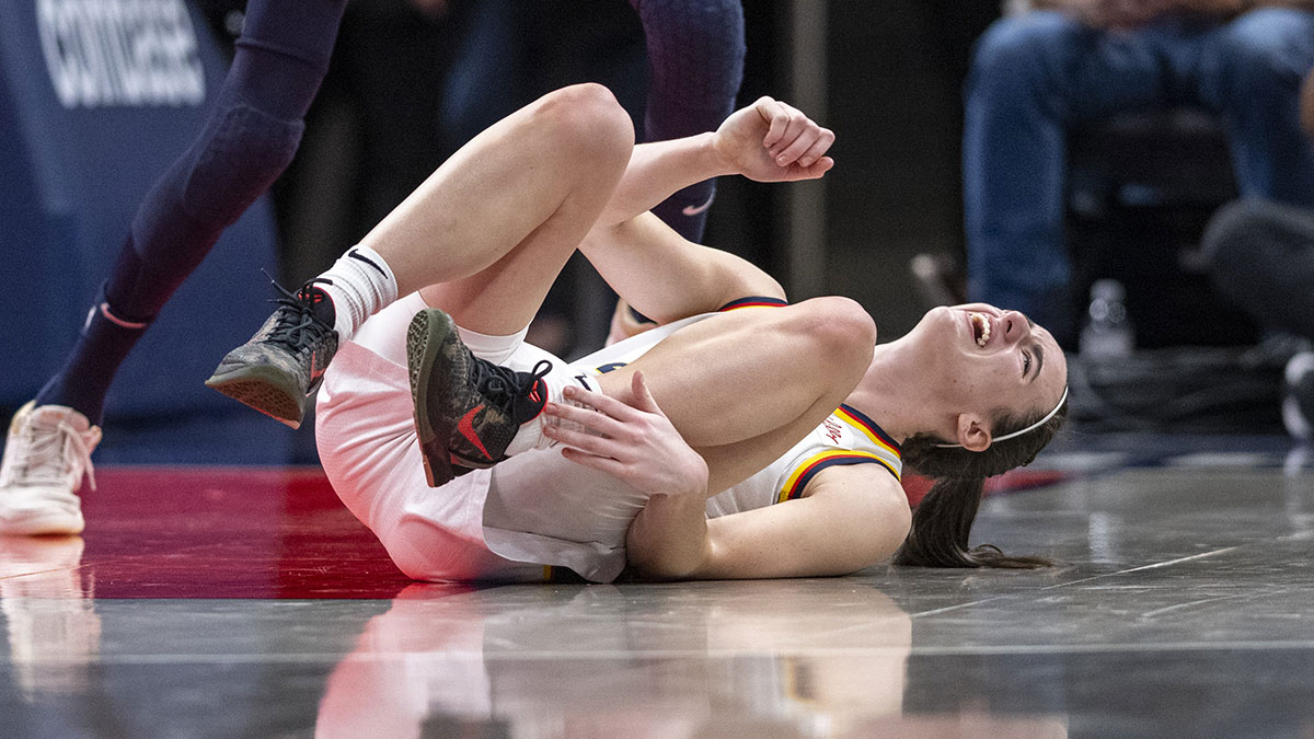 Indiana Fever guard Caitlin Clark (22) reacts after being injured during the first half of an WNBA basketball game against the Connecticut Sun, Monday, May 20, 2024, at Gainbridge Fieldhouse.