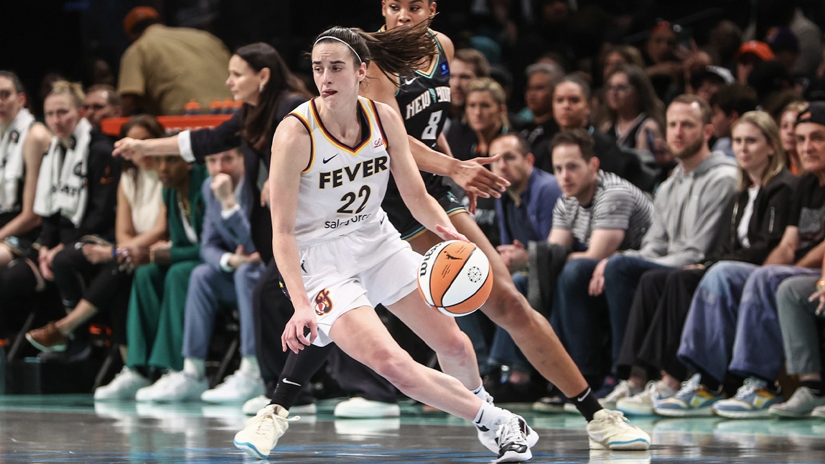 Indiana Fever guard Caitlin Clark (22) spins away from New York Liberty forward Nyara Sabally (8) in the fourth quarter at Barclays Center.