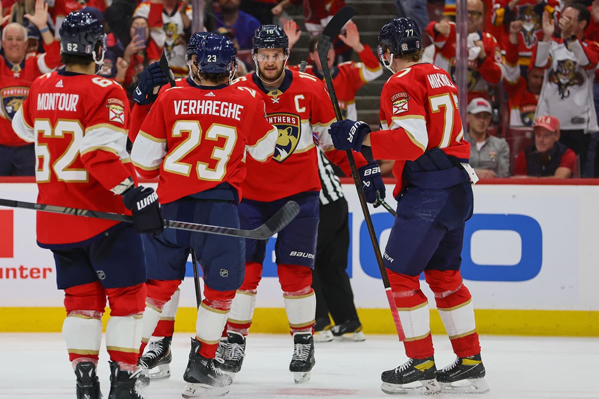 Florida Panthers center Aleksander Barkov (16) celebrates with teammates after scoring against the New York Rangers during the third period in game three of the Eastern Conference Final of the 2024 Stanley Cup Playoffs at Amerant Bank Arena.