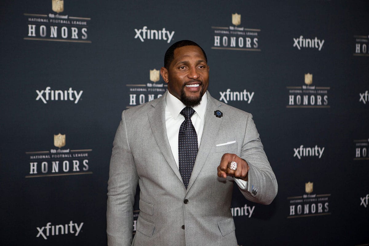 Former Baltimore Ravens linebacker Ray Lewis shows his ring and poses for photos at the 4th Annual NFL Honors January 31, 2015 in Phoenix, Arizona.
