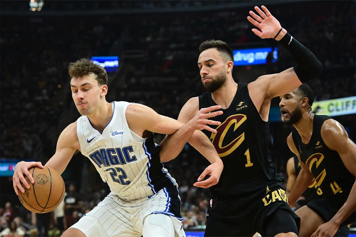 Cleveland Cavaliers guard Max Strus (1) defends Orlando Magic forward Franz Wagner (22) during the first half in game seven of the first round for the 2024 NBA playoffs at Rocket Mortgage FieldHouse. 
