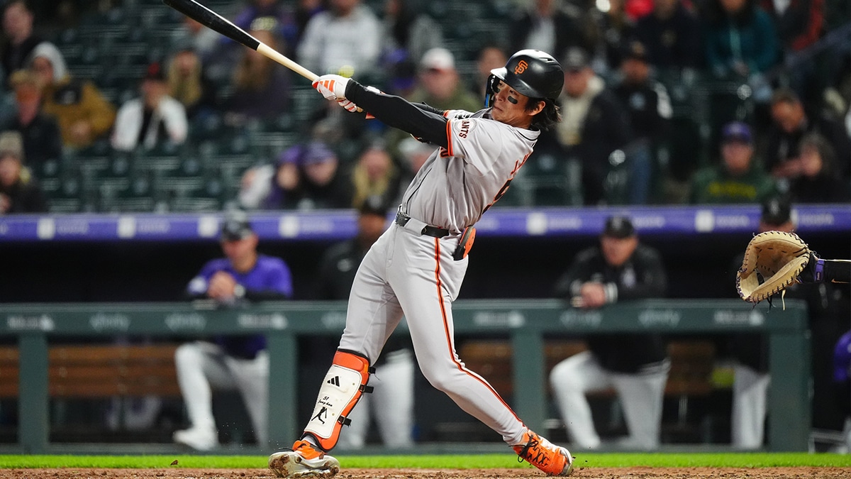 San Francisco Giants outfielder Jung Hoo Lee (51) swings the batt in the eighth inning against the Colorado Rockies at Coors Field.