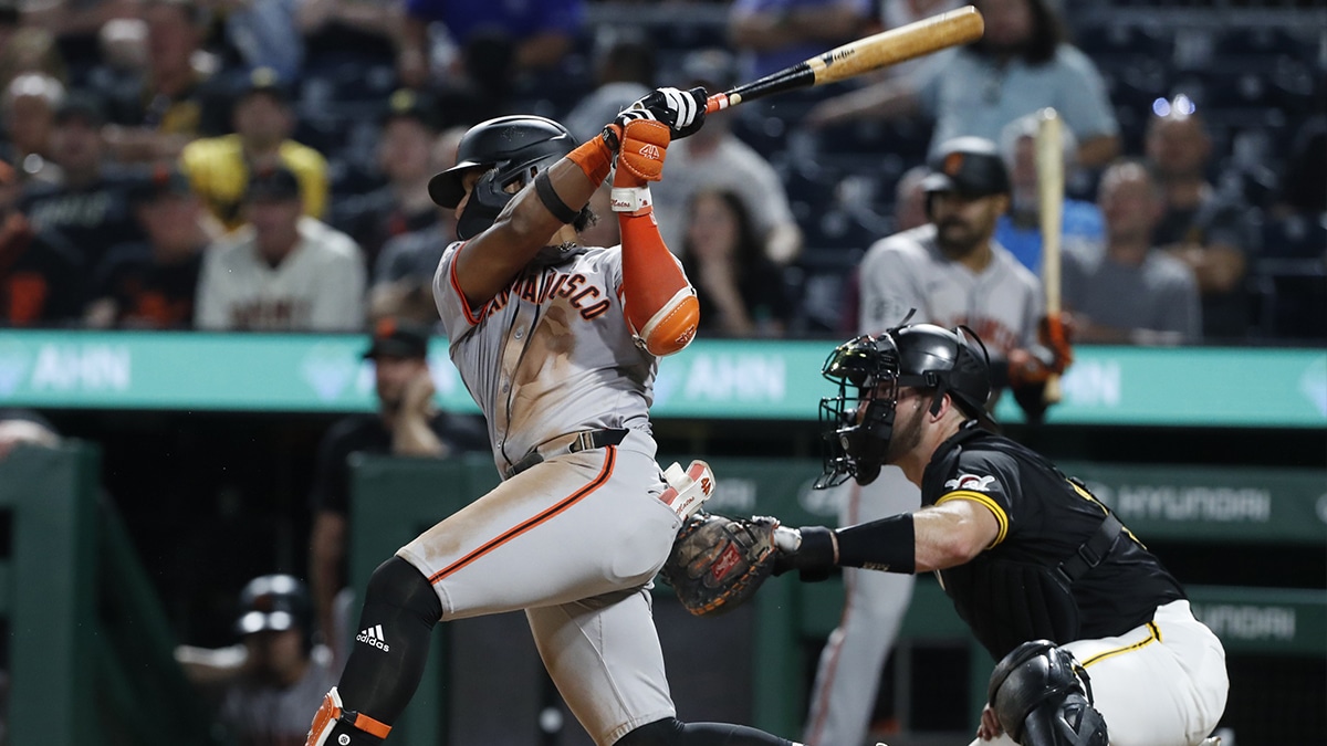 San Francisco Giants center fielder Luis Matos (29) hits an RBI single against the Pittsburgh Pirates during the tenth inning at PNC Park. The Giants won 9-5 in ten innings.