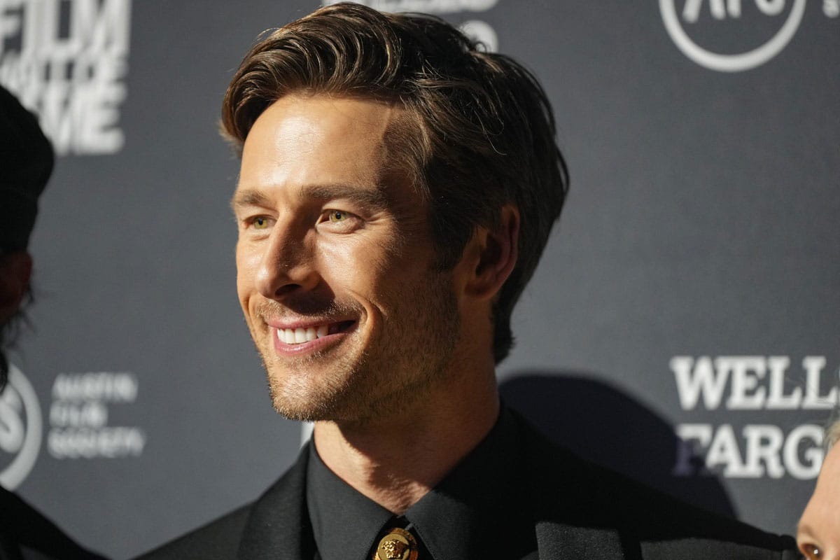 Glen Powell on red carpet for Austin Film Society's Toast to Texas Film at Troublemaker Studios in 2024.