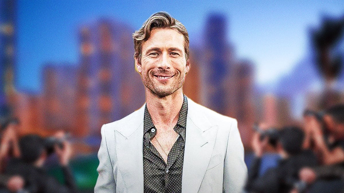 Hit Man star Glen Powell on red carpet.