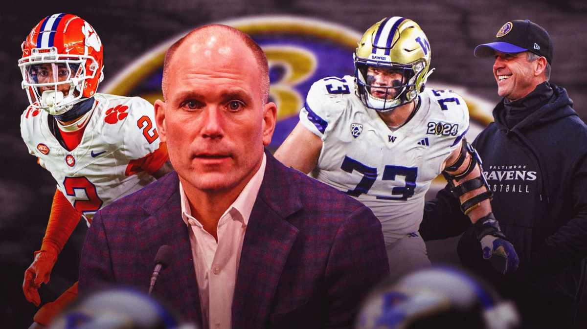Eric DeCosta in the middle, Nate Wiggins, Roger Rosengarten, Coach John Harbaugh around him, Baltimore Ravens wallpaper in the background