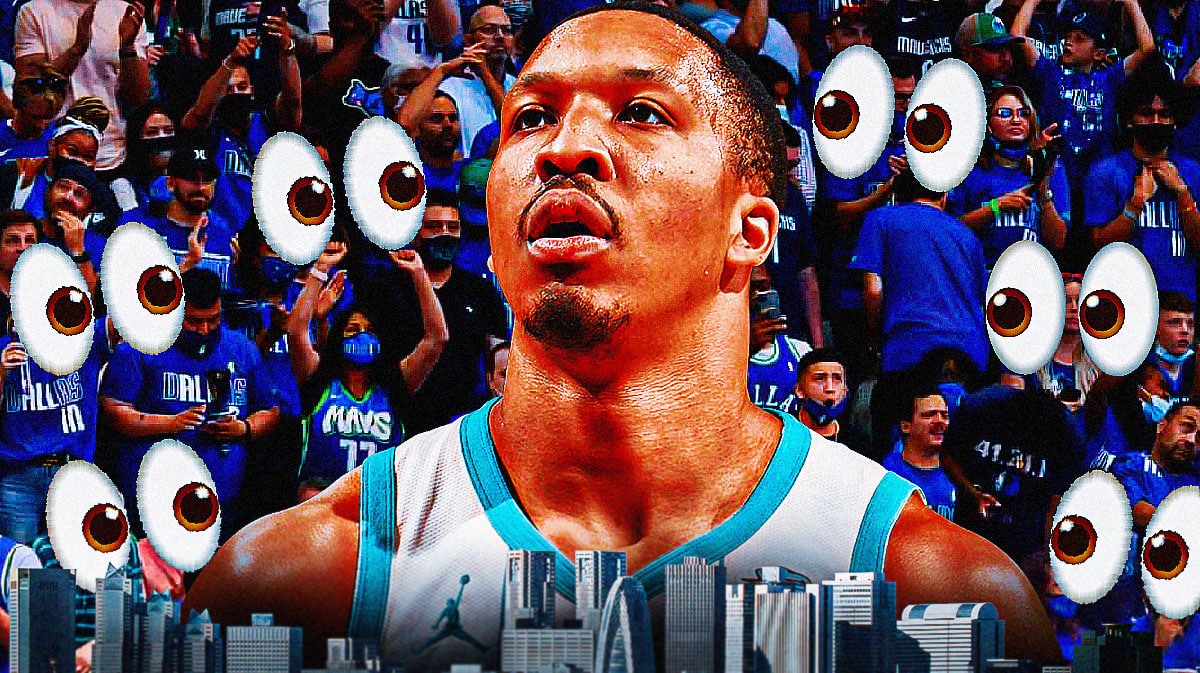 Grant Williams on one side, a bunch of Dallas Mavericks fans on the other side with the big eyes emoji over their faces