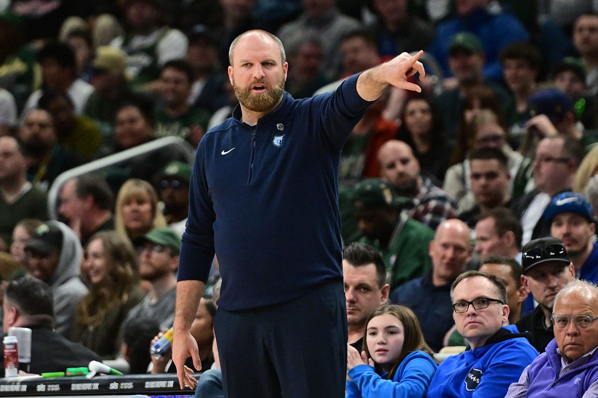 Memphis Grizzlies head coach Taylor Jenkins calls a play in the second quarter against the Milwaukee Bucks at Fiserv Forum
