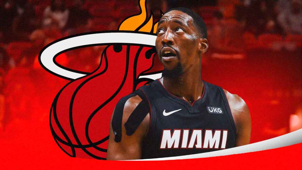 Heat's Bam Adebayo looks at Panthers' Cam Newton after All-NBA teams announced