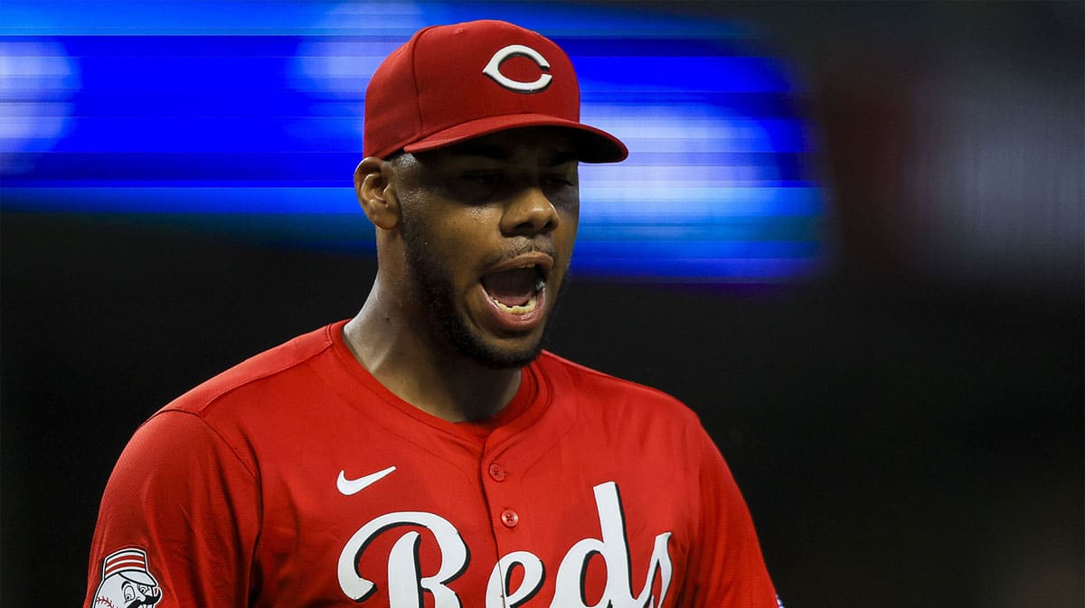 Cincinnati Reds starting pitcher Hunter Greene (21) reacts after a play in the sixth inning against the Los Angeles Dodgers at Great American Ball Park.