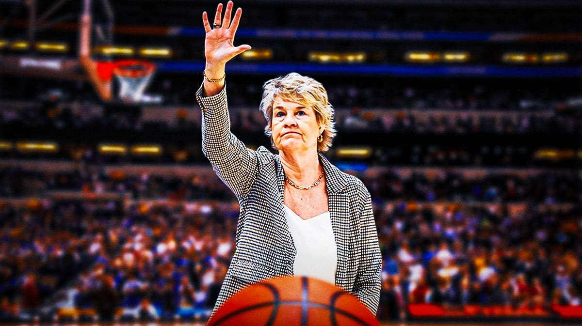 Iowa coach Lisa Bluder waving goodbye