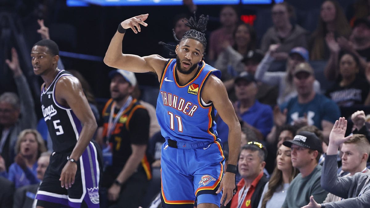 Oklahoma City Thunder guard Isaiah Joe (11) gestures after scoring a three-point basket against the Sacramento Kings during the second quarter at Paycom Center.