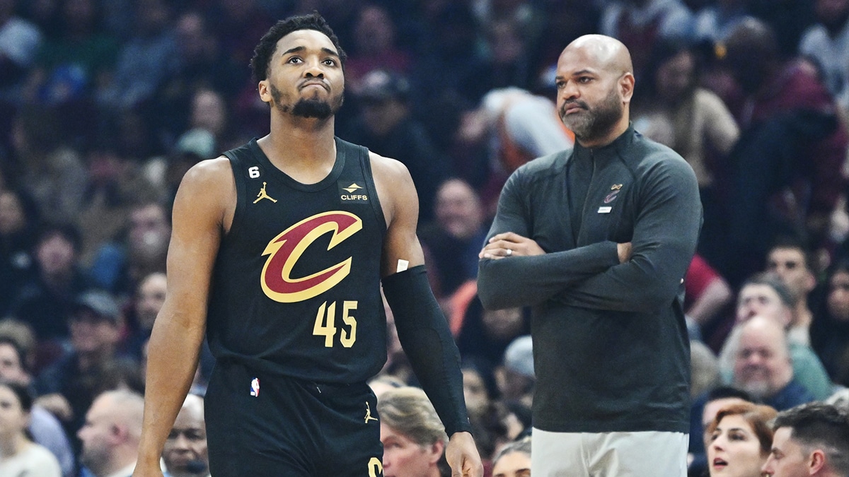 Cleveland Cavaliers guard Donovan Mitchell (45) and head coach J.B. Bickerstaff react after a foul during the first quarter against the Boston Celtics at Rocket Mortgage FieldHouse.