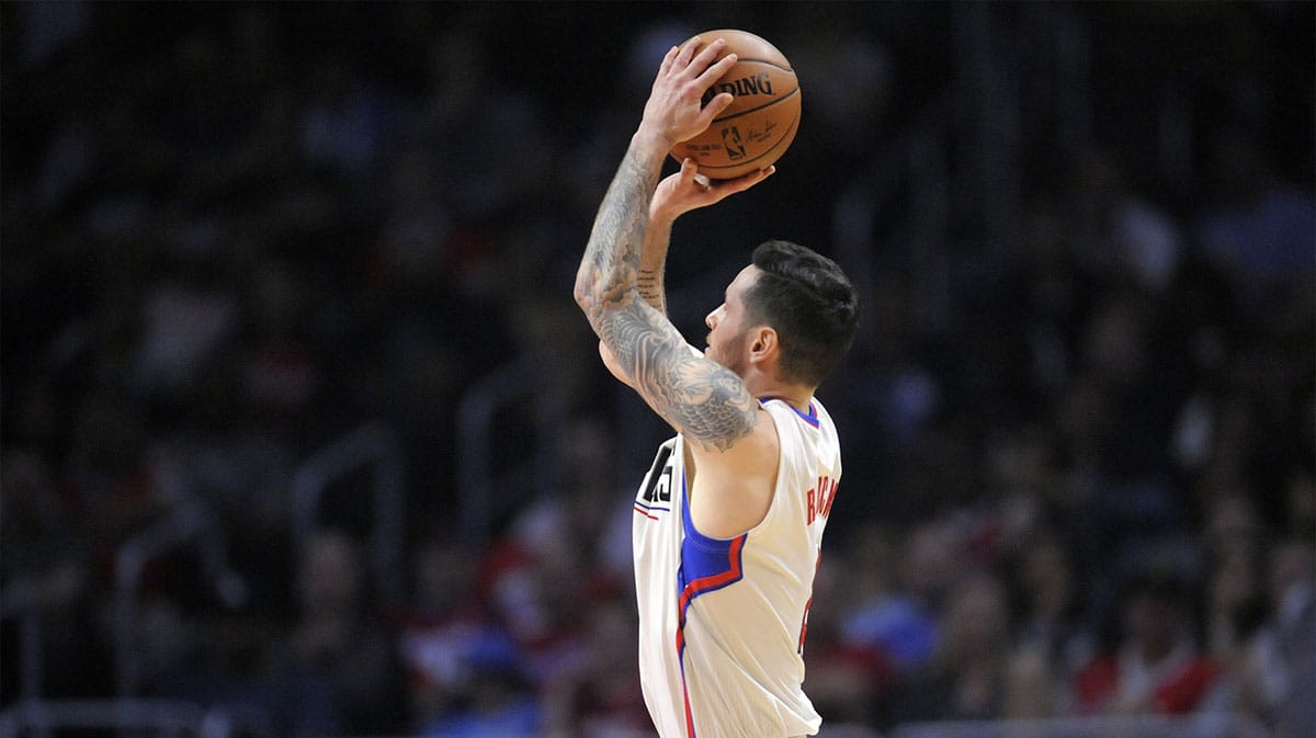 Los Angeles Clippers guard J.J. Redick (4) shoots against the Milwaukee Bucks during the first half at Staples Center.