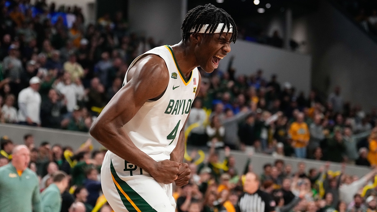Baylor Bears guard Ja'Kobe Walter (4) reacts after a forcing a turnover against the Brigham Young Cougars during the first half at Paul and Alejandra Foster Pavilion