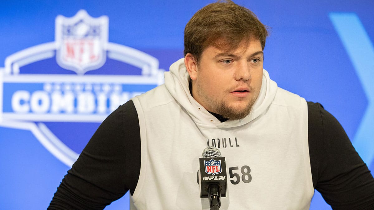 Oregon offensive lineman Jackson Powers-Johnson (OL58) talks to the media during the 2024 NFL Combine at Lucas Oil Stadium.