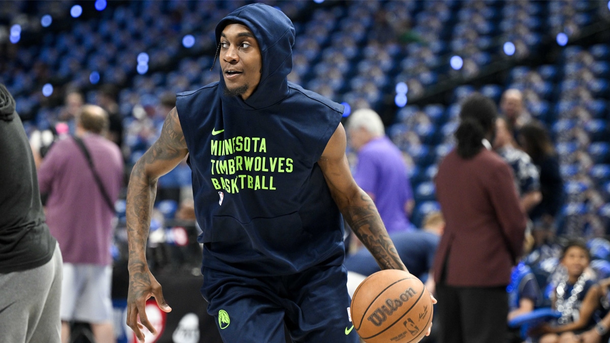Minnesota Timberwolves forward Jaden McDaniels (3) warms up before the game between the Dallas Mavericks and the Minnesota Timberwolves in game three of the western conference finals for the 2024 NBA playoffs at American Airlines Center. 