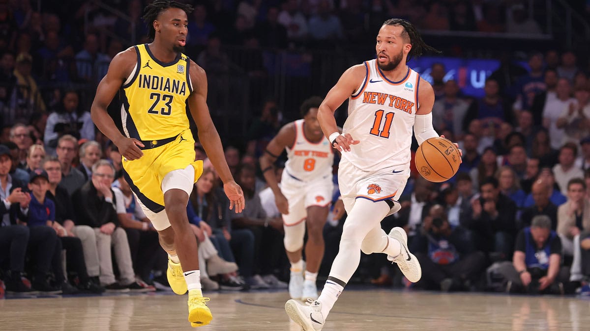 New York Knicks guard Jalen Brunson (11) brings the ball up court against Indiana Pacers forward Aaron Nesmith (23) during the first quarter of game one of the second round of the 2024 NBA playoffs at Madison Square Garden