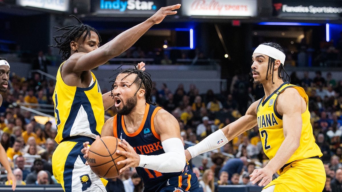 New York Knicks guard Jalen Brunson (11) shoots the ball while Indiana Pacers forward Aaron Nesmith (23) defends during game four of the second round for the 2024 NBA playoffs at Gainbridge Fieldhouse