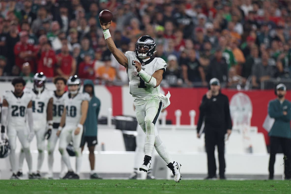 Philadelphia Eagles quarterback Jalen Hurts (1) throws against the Tampa Bay Buccaneers during the second half of a 2024 NFC wild card game at Raymond James Stadium.