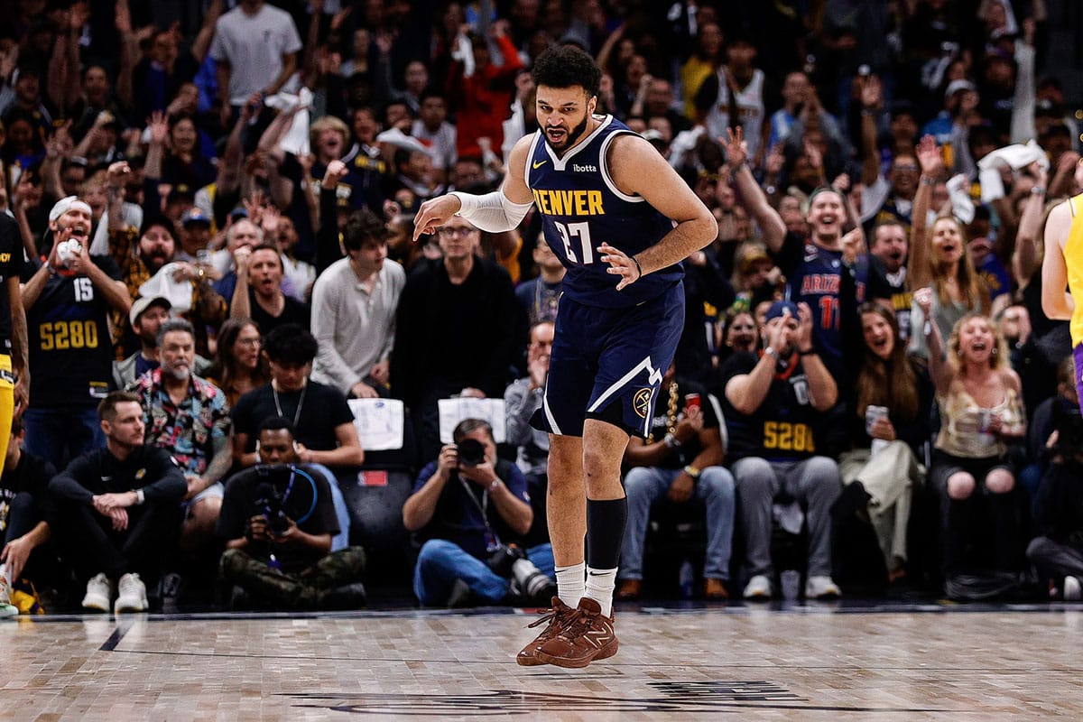 Denver Nuggets guard Jamal Murray (27) reacts after a shot in the first quarter against the Los Angeles Lakers during game five of the first round for the 2024 NBA playoffs at Ball Arena.