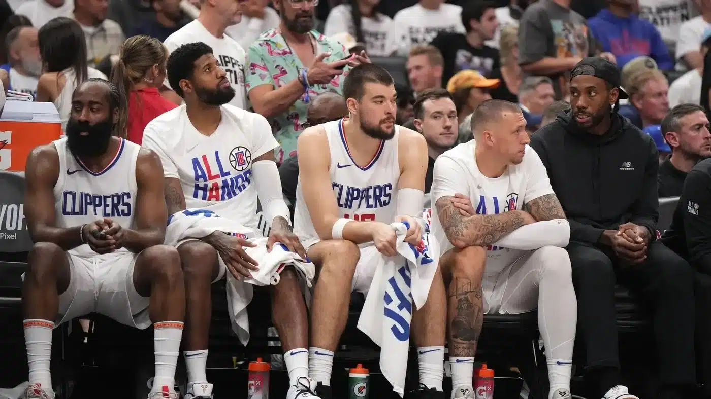 Los Angeles, California, USA; LA Clippers guard James Harden (1), forward Paul George (13), center Ivica Zubac (40), center Daniel Theis (10) and forward Kawhi Leonard (2) react in the second half during game five of the first round for the 2024 NBA playoffs at Crypto.com Arena.
