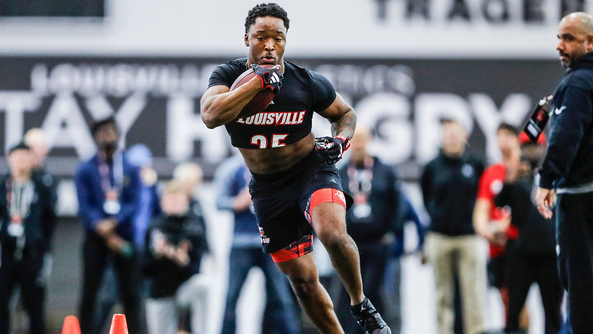 Louisville running back Jawhar Jordan works in front of NFL scouts for Louisville football's Pro Day Tuesday morning.
