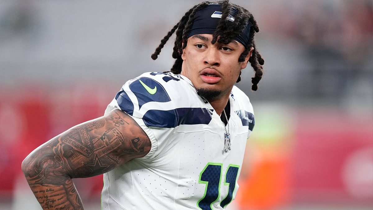 Seattle Seahawks wide receiver Jaxon Smith-Njigba (11) warms up prior to facing the Arizona Cardinals at State Farm Stadium.
