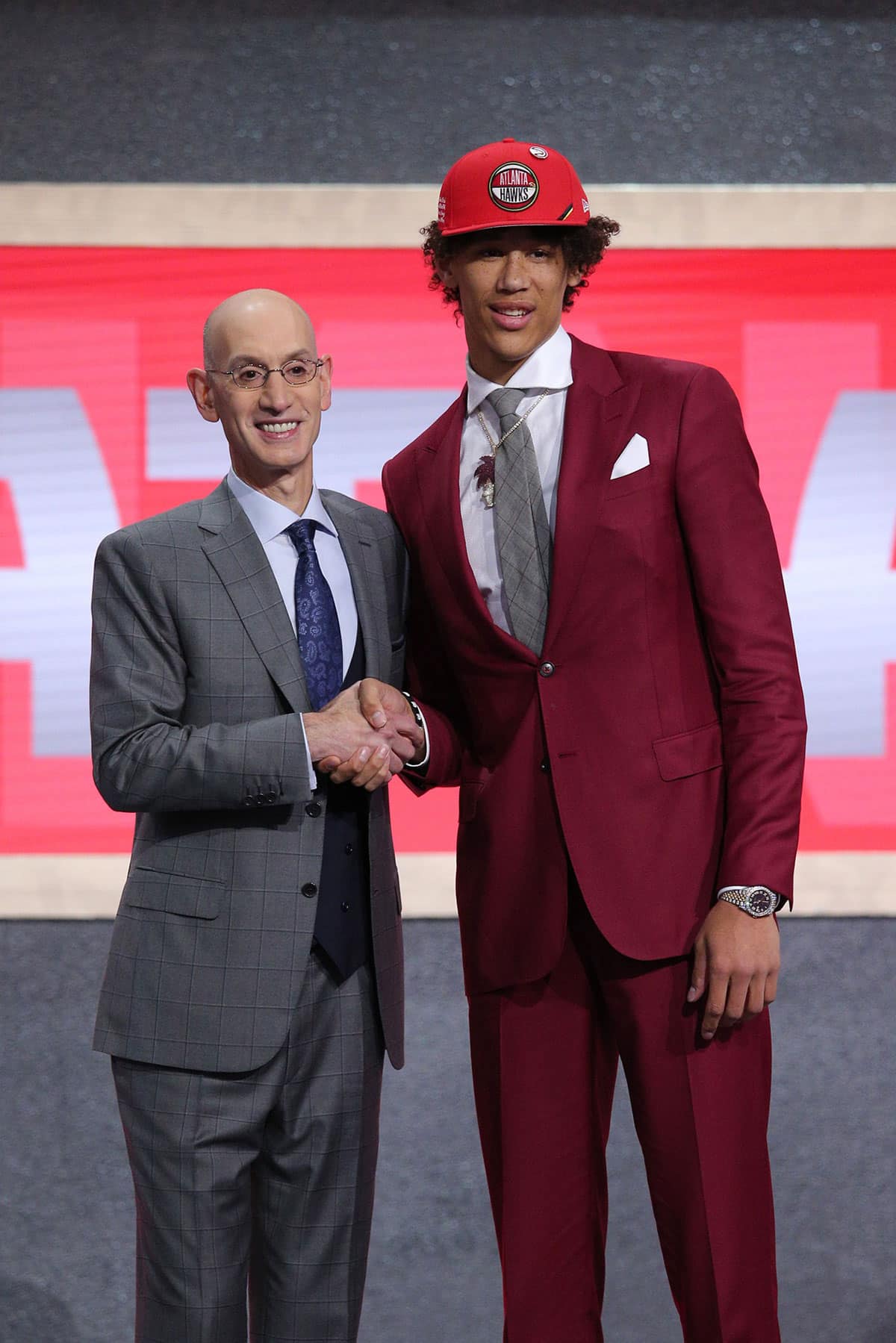 Jaxson Hayes (Texas) greets NBA commissioner Adam Silver after being selected as the number eighth overall pick to the Atlanta Hawks