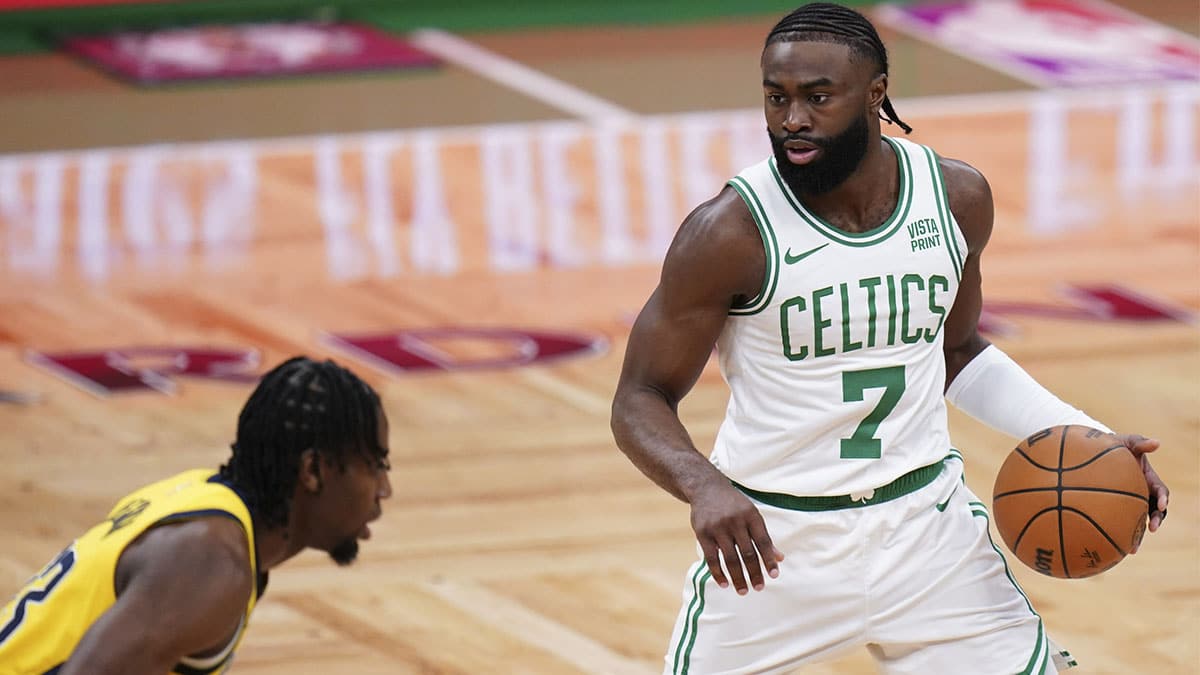 Boston Celtics guard Jaylen Brown (7) dribbles the ball against the Indiana Pacers in the first half for game one of the eastern conference finals for the 2024 NBA playoffs at TD Garden.