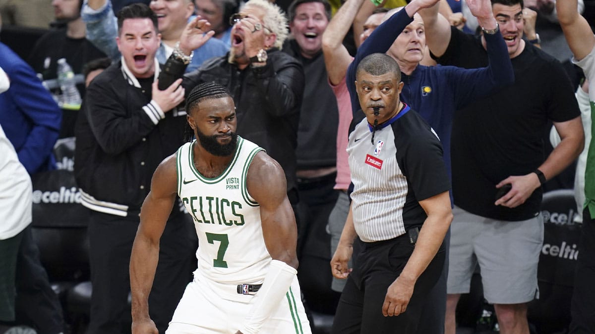 Boston Celtics guard Jaylen Brown (7) reacts after his three point basket sending the game into overtime against the Indiana Pacers in the fourth quarter during game one of the eastern conference finals for the 2024 NBA playoffs at TD Garden.