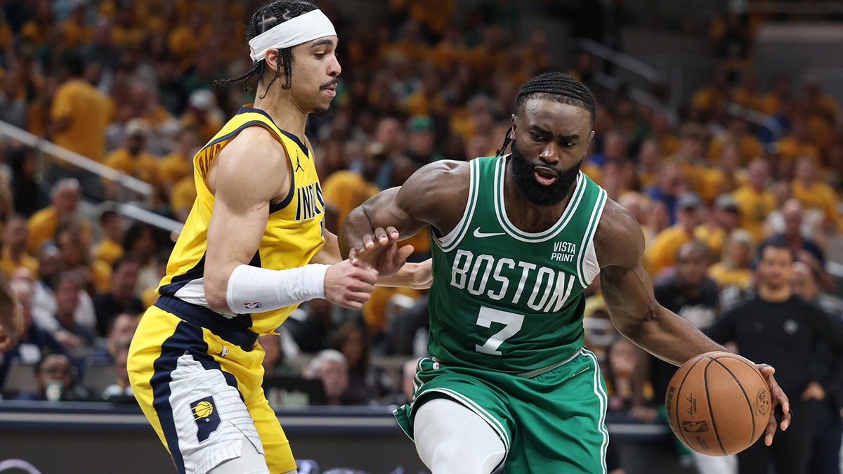 Boston Celtics guard Jaylen Brown (7) controls the ball against Indiana Pacers guard Andrew Nembhard (2) during the third quarter of game three of the eastern conference finals in the 2024 NBA playoffs at Gainbridge Fieldhouse