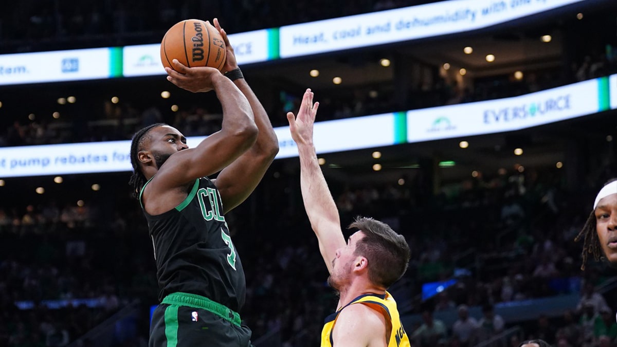 Boston Celtics guard Jaylen Brown (7) shoots the ball against Indiana Pacers guard T.J. McConnell (9) in the first half during game two of the eastern conference finals for the 2024 NBA playoffs at TD Garden