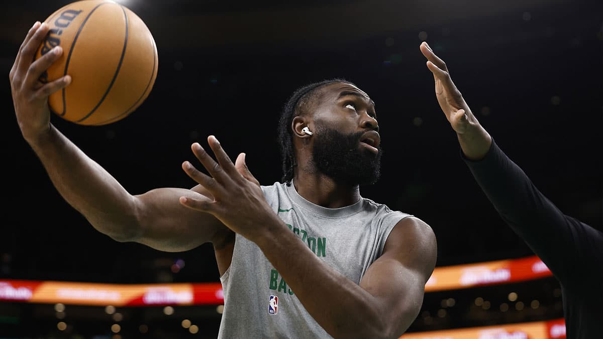 Boston Celtics guard Jaylen Brown (7) warms up before playing the Miami Heat in game five of the first round of the 2024 NBA playoffs at TD Garden.