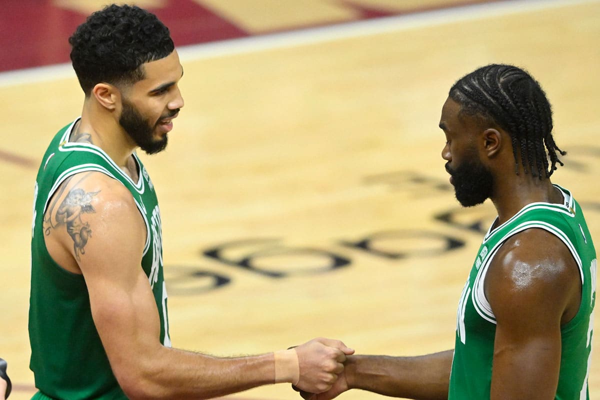 Boston Celtics forward Jayson Tatum (0) and guard Jaylen Brown (7) celebrate after a win over the Cleveland Cavaliers in game four of the second round for the 2024 NBA playoffs at Rocket Mortgage FieldHouse.